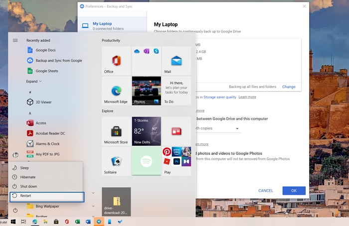 Premere il tasto Maiusc e fare clic sull'opzione Riavvia